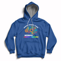 Royal blue autism awareness hoodie with colorful gear graphic, front pocket, drawstring