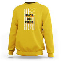 Yellow crewneck sweatshirt with American flag stripes and “BLACK AND PROUD” front graphic