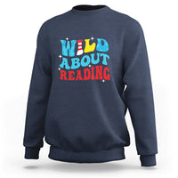 Navy reading sweatshirt with 'WILD ABOUT READING' front graphic