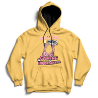 Yellow gamer hoodie with front pouch pocket and colorful gaming graphic on chest