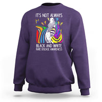 Kids purple crewneck sweatshirt with zebra and rainbow awareness graphic on front.