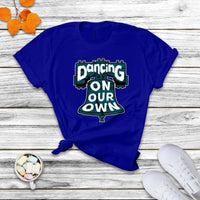 Navy crew-neck T-shirt with colorful "Dancing On Our Own" graphic front.