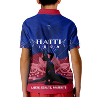 Kids polo shirt, blue with red collar and back Haiti graphic print