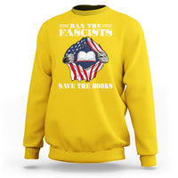 Daisy yellow crewneck sweatshirt with patriotic fist holding open book graphic