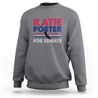 Light heather gray crewneck sweatshirt with front graphic text: KATIE PORTER FOR SENATE