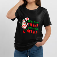 Black crew-neck T-shirt worn by person, with cartoon Christmas tree and quote graphic