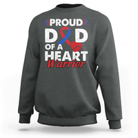 Adult dark heather sweatshirt with “PROUD D D OF A HEART Warrior” graphic and ribbon heart