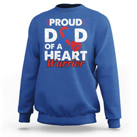 Adult royal blue sweatshirt with “PROUD D D OF A HEART Warrior” graphic and ribbon heart