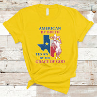 Daisy yellow Texan graphic T-shirt with cowboy and Texas flag print, crew neck.