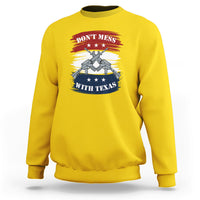Texas graphic crewneck sweatshirt, daisy yellow, with crossed-guns emblem on chest