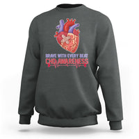 Dark gray sweatshirt with red-and-blue heart graphic and CHD awareness text print