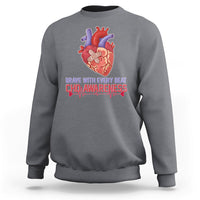 Heather gray sweatshirt with red-and-blue heart graphic and CHD awareness text print