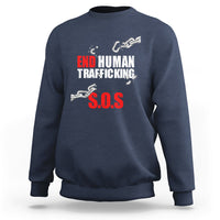 Navy crewneck sweatshirt with 'END HUMAN TRAFFICKING' and red 'S.O.S.' front graphic