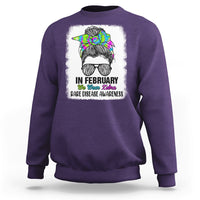 Purple crewneck sweatshirt with zebra messy-bun graphic and 'Rare Disease Awareness'