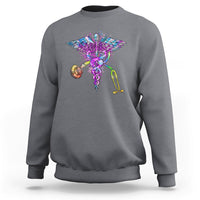Charcoal gray crewneck sweatshirt with colorful stethoscope and wings graphic.