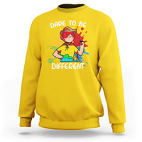 Daisy yellow boys autism awareness sweatshirt with colorful “Dare to be Different” graphic