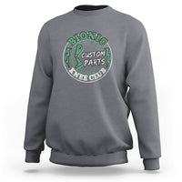 Light gray crewneck sweatshirt with front logo graphic, ribbed cuffs and hem