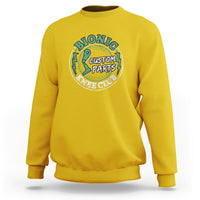 Yellow crewneck sweatshirt with front logo graphic, ribbed cuffs and hem