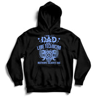 Black hoodie with front graphic and text "NOTHING SCARES ME"