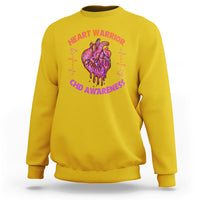 Daisy yellow crewneck sweatshirt with back heart graphic and CHD Awareness text