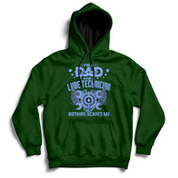 Forest green hoodie with front graphic and text "NOTHING SCARES ME"