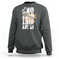 Dark heather crewneck sweatshirt with distressed front graphic print, long sleeves and ribbed cuffs
