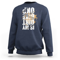 Dark blue crewneck sweatshirt with distressed front graphic print, long sleeves and ribbed cuffs