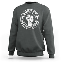 Dark heather gray crewneck sweatshirt with round “Built by Black History” graphic badge