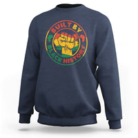 Charcoal gray adult sweatshirt with crew neck and circular fist graphic