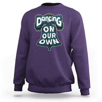 Purple crewneck sweatshirt for adults with large front slogan graphic