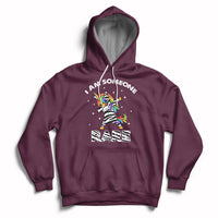 Maroon hoodie with rainbow zebra unicorn graphic, front pocket and drawstring hood