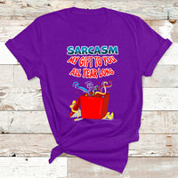 Purple Christmas T-shirt with colorful 'Sarcasm my gift to you all year long' graphic