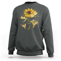 Dark heather gray adult crewneck sweatshirt with sunflower and dragonfly graphic