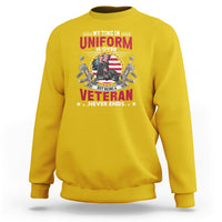 Gold yellow veteran graphic sweatshirt with 'Uniform is Over' and 'Veteran Never Ends' print