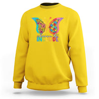 Daisy yellow crewneck sweatshirt with colorful butterfly “choose to INCLUDE” graphic on chest