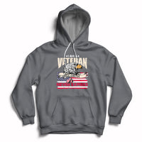 Charcoal pullover hoodie with front pocket and patriotic veteran graphic, hood with white drawstrings.