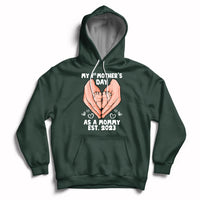 Forest green maternity Mother's Day hoodie with back hands graphic and 'Est. 2023' text