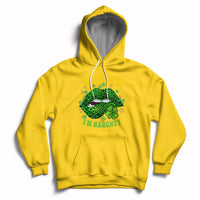 Yellow hoodie with shamrock leopard-lips graphic, “KISS ME” and “I’M NAUGHTY” on front