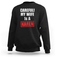 Black crewneck sweatshirt with “CAREfULL! MY WIFE IS A KAREN” graphic on front
