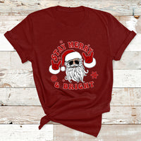 Christmas graphic T-shirt, maroon red, Santa face with “Stay Merry & Bright”