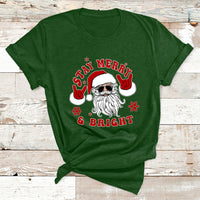 Christmas graphic T-shirt, forest green, Santa face with “Stay Merry & Bright”
