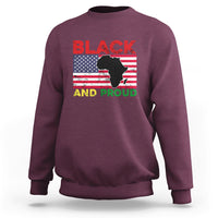 Maroon crewneck sweatshirt with 'BLACK AND PROUD' graphic, Africa map flag silhouette