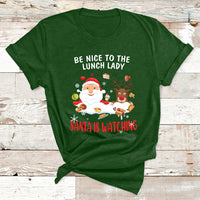 Green Christmas T-shirt with Santa and reindeer; text reads “Be Nice to the Lunch Lady”