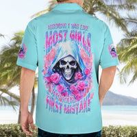 Blue Hawaiian shirt with large back skull-and-rose graphic and drippy text, short sleeves.