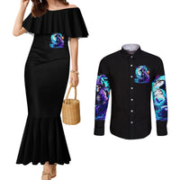 Black off-shoulder fitted mermaid dress with blue skull chest print; black long-sleeve button shirt.