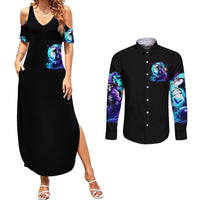 Black maxi dress with short sleeve skull print and matching black long-sleeve button shirt with pocket graphic