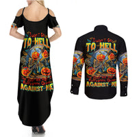 Black maxi dress and long-sleeve button shirt set with devil graphic, back views.