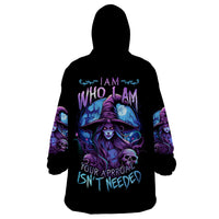 Wearable blanket hoodie in black with purple witch and skull graphic, hood and long sleeves