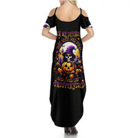 Black off-shoulder skull graphic maxi dress with colorful witchy print