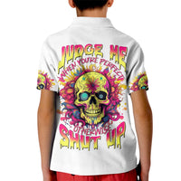 Kids white polo shirt with colorful flower skull graphic and bold back slogan